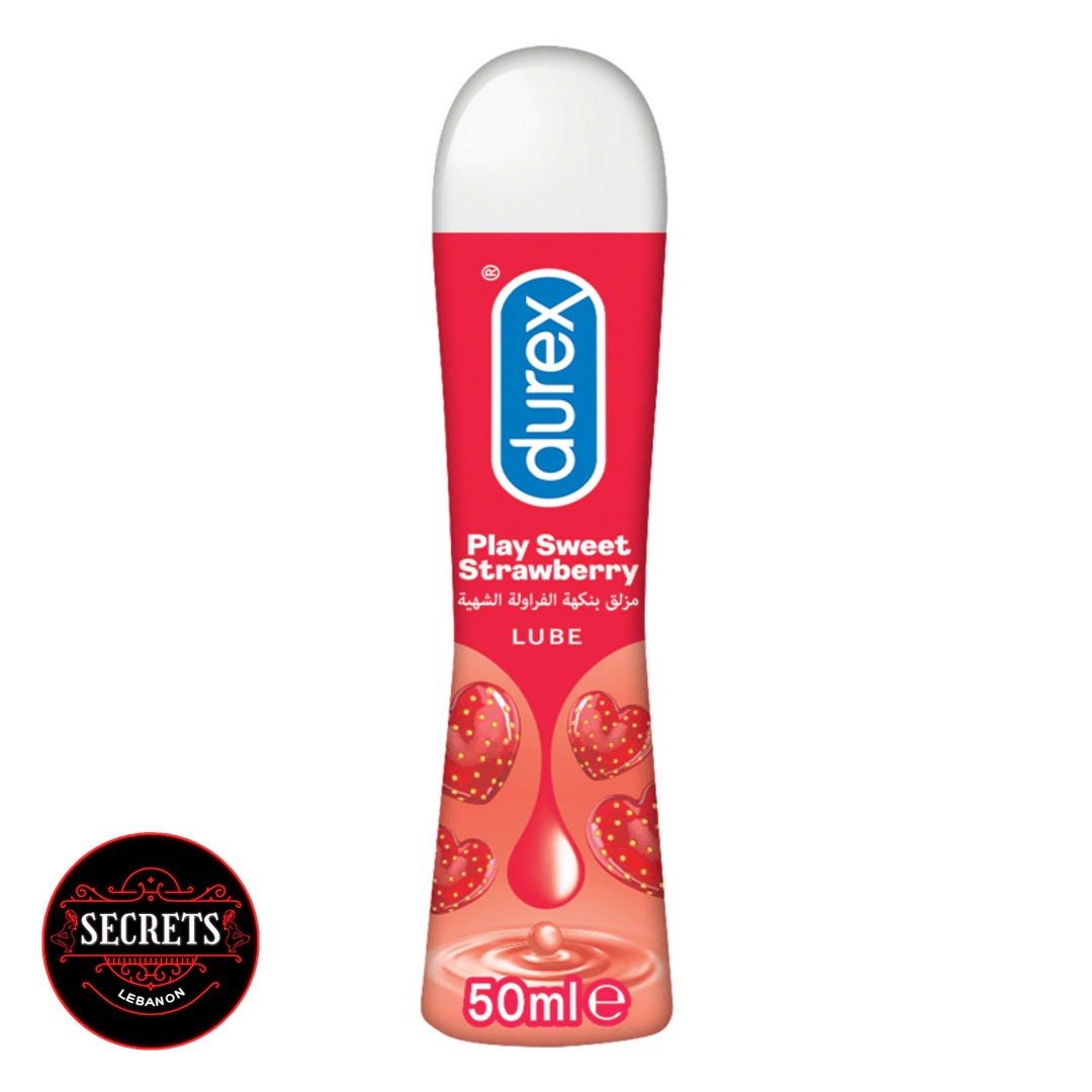 Lubricant Lebanon two hands holding Durex Play Sweet Strawberry red bottle