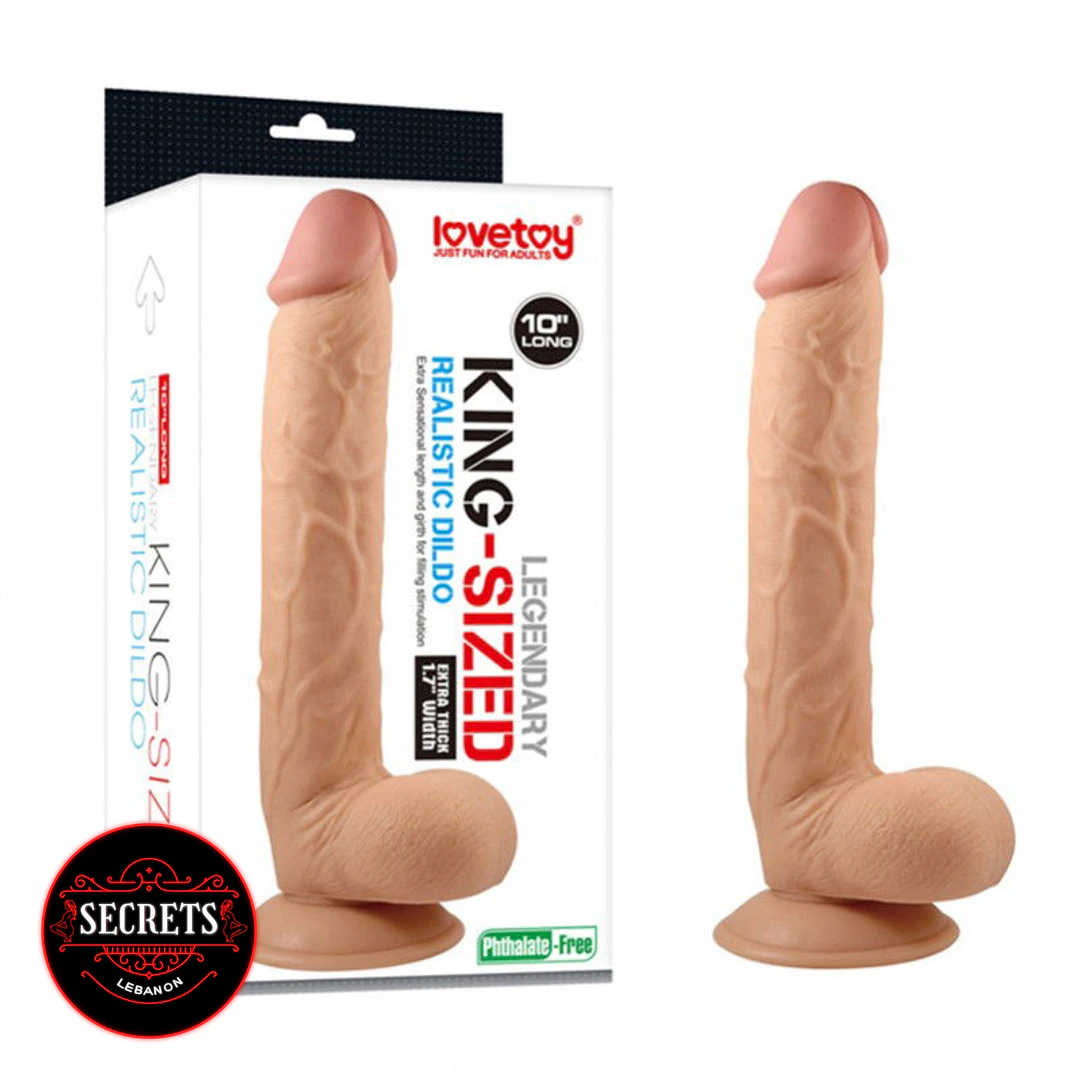 10 Inch King-Sized Realistic Dildo with suction base beside retail packaging