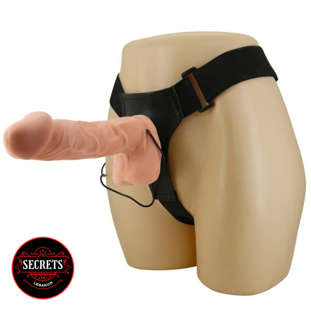 Angled overhead shot of the 10 Inch Vibrating Strap On Dildo highlighting realistic design