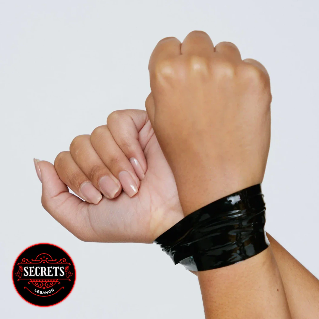 15M Non Sticky Bondage Tape wrapped around two wrists in black