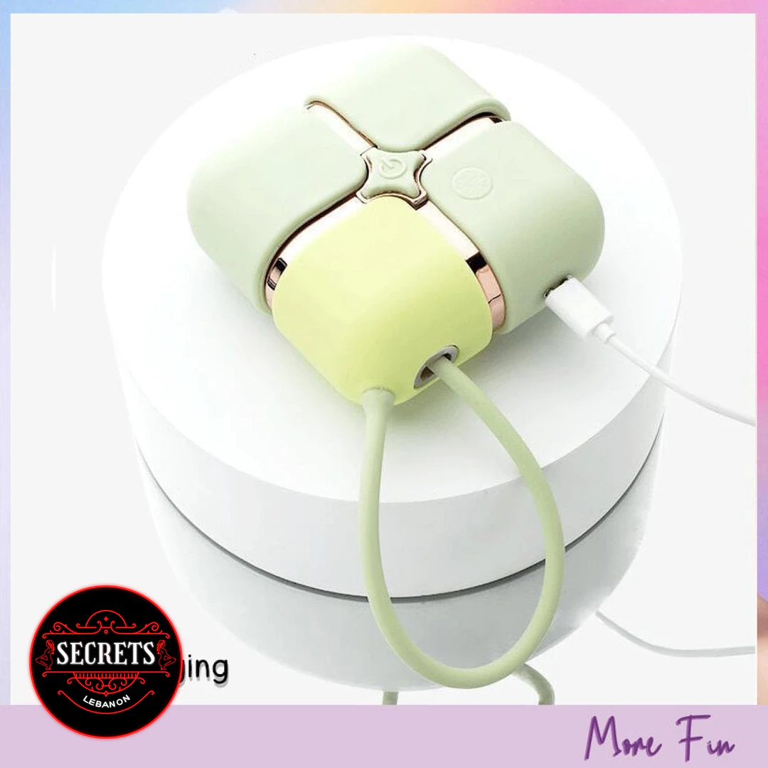 2 In 1 Sucker Jumping Egg Vibrator in mint green with USB charging cable