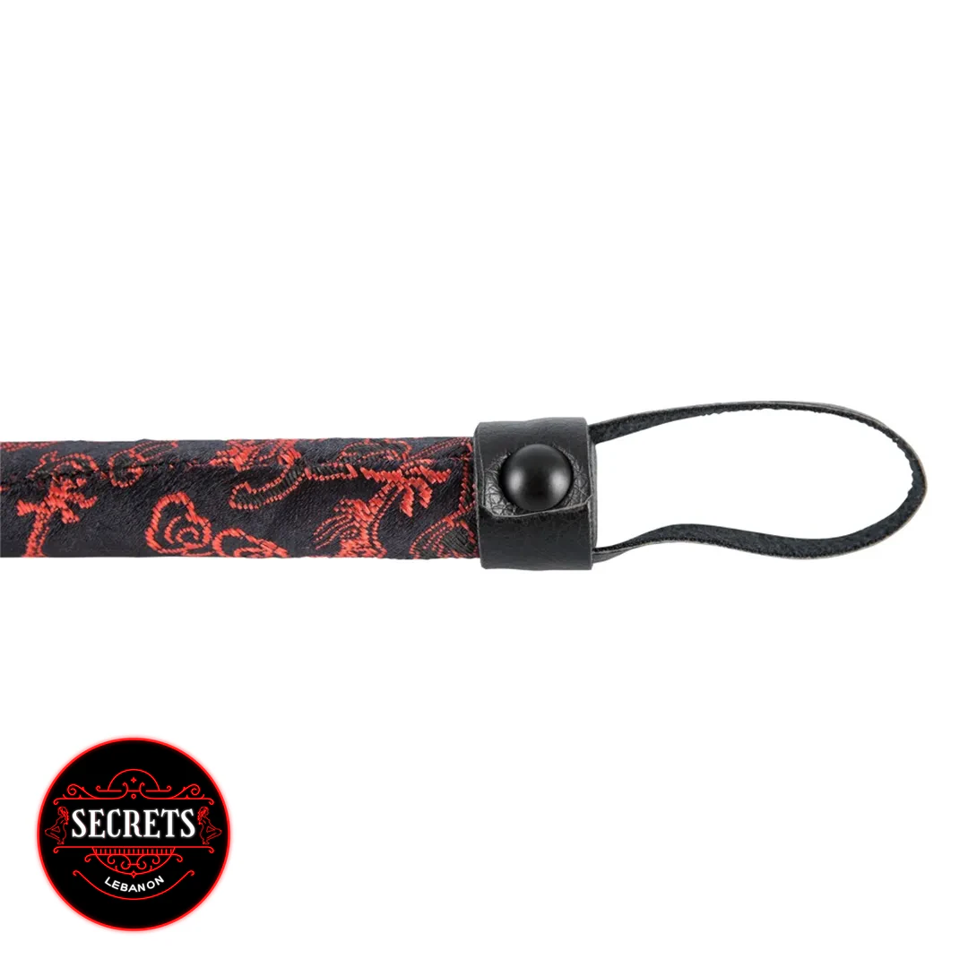 3 Piece Brocade BDSM Kit handle close-up with red floral fabric and black loop