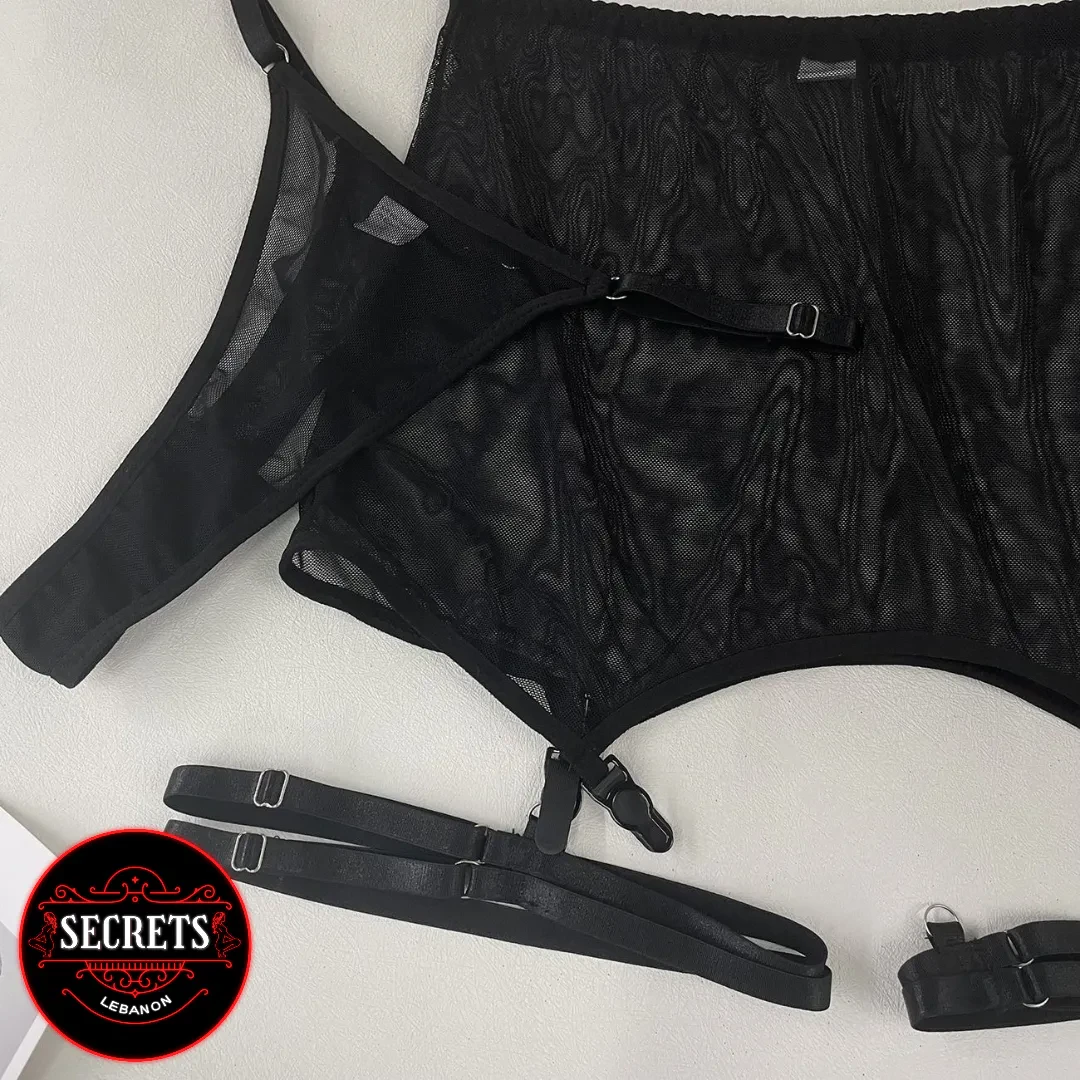 3 Piece Mesh Halter Garter Set laid flat in black sheer fabric