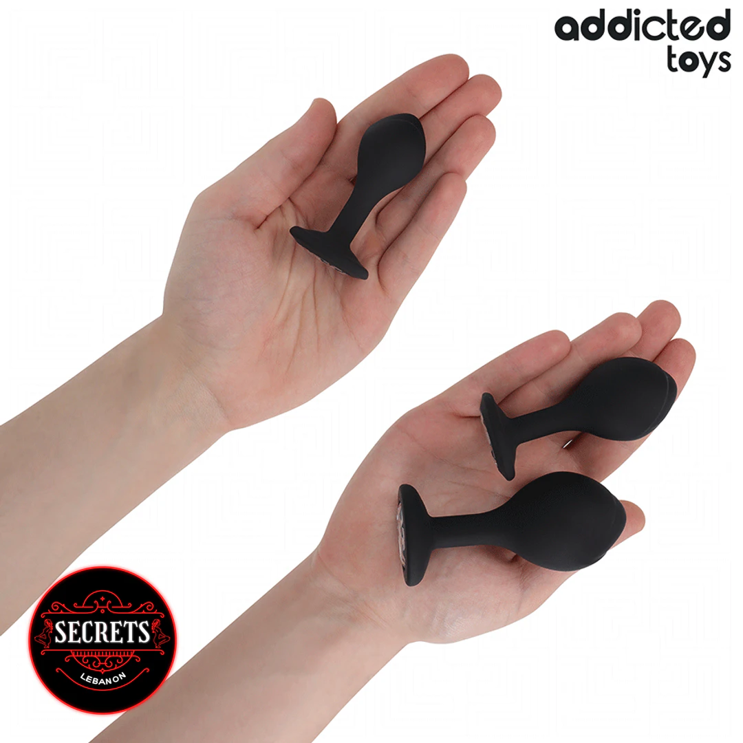 3 Sizes Jewel Base Butt Plug Set held in open palms showing size comparison