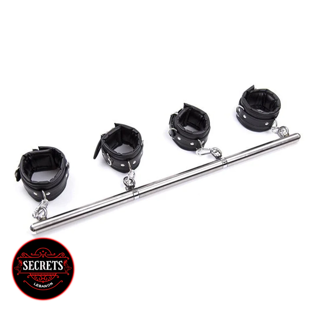4 Cuff Steel Spreader Bar Set with black padded cuffs on white background