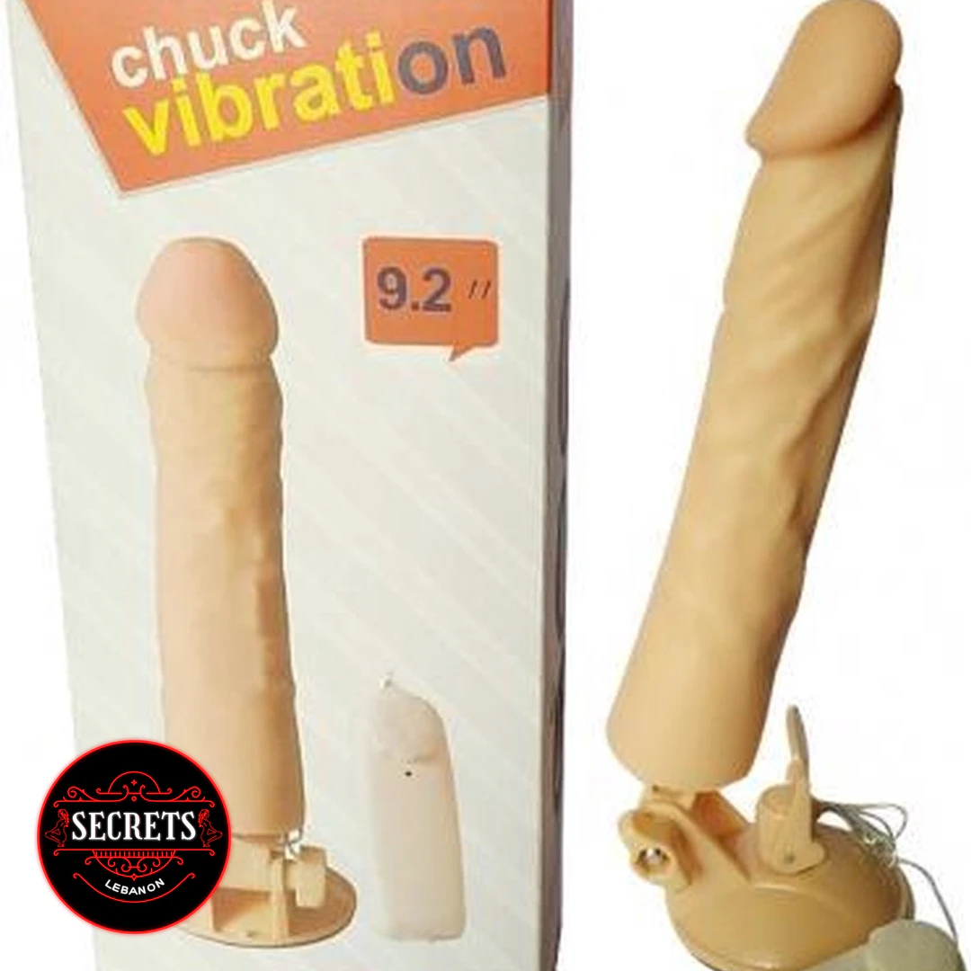 9 Inch Stand Base Vibrator Dildo shown beside retail box, flesh tone