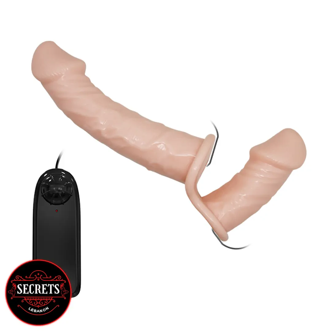 Baile Ultra Dual Penis Strap-On in flesh tone with black wired controller