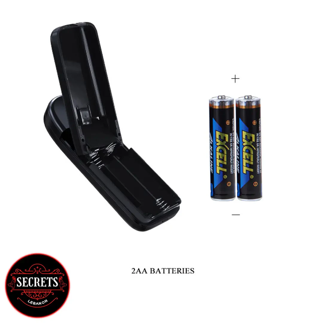 Baile Ultra Dual Penis Strap-On open battery compartment with two AA batteries