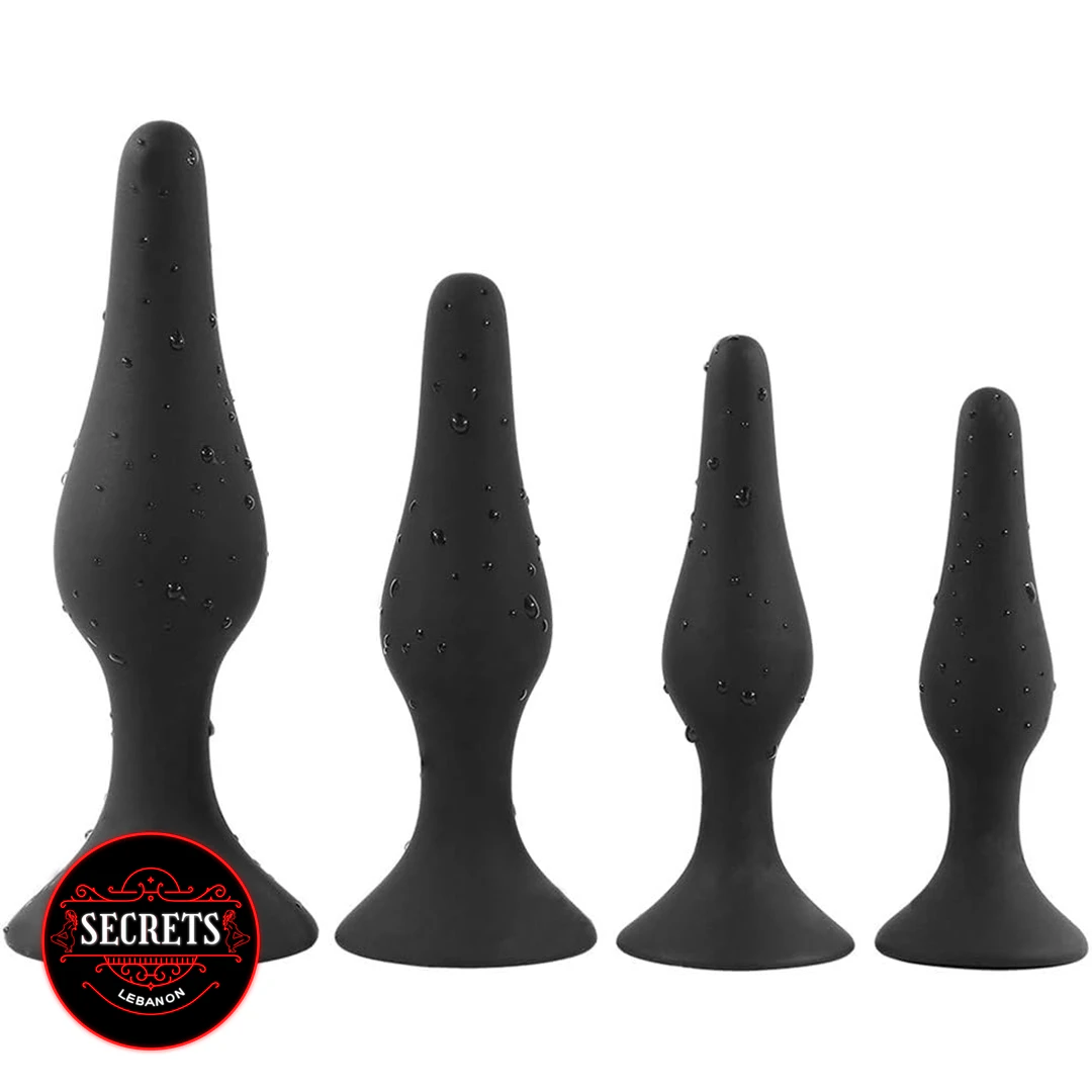 Beginner To Advanced Anal Plug Set four black silicone plugs with suction bases