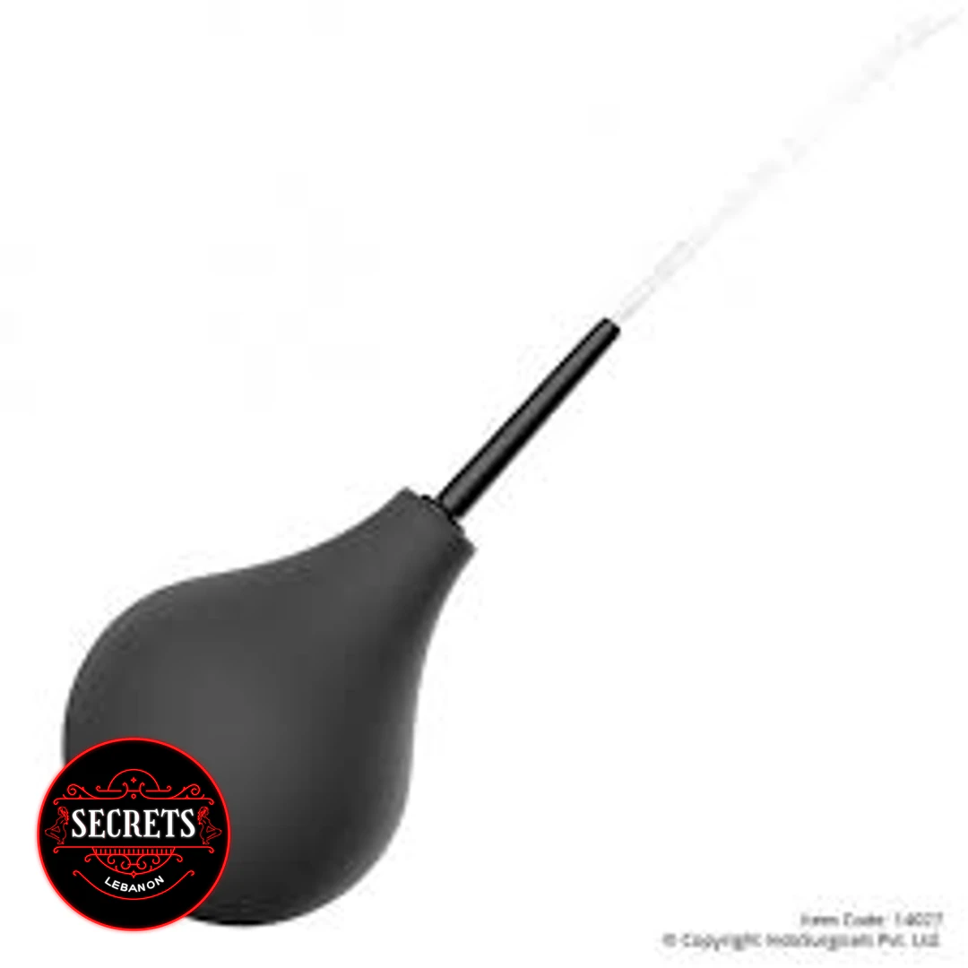 Beginners Classic Silicone Enema black bulb with narrow nozzle squirting water