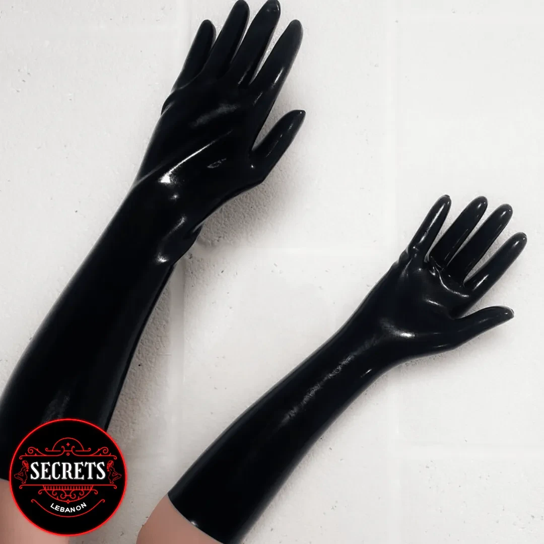 Black Latex Bondage Gloves elbow-length pair laid flat on white surface