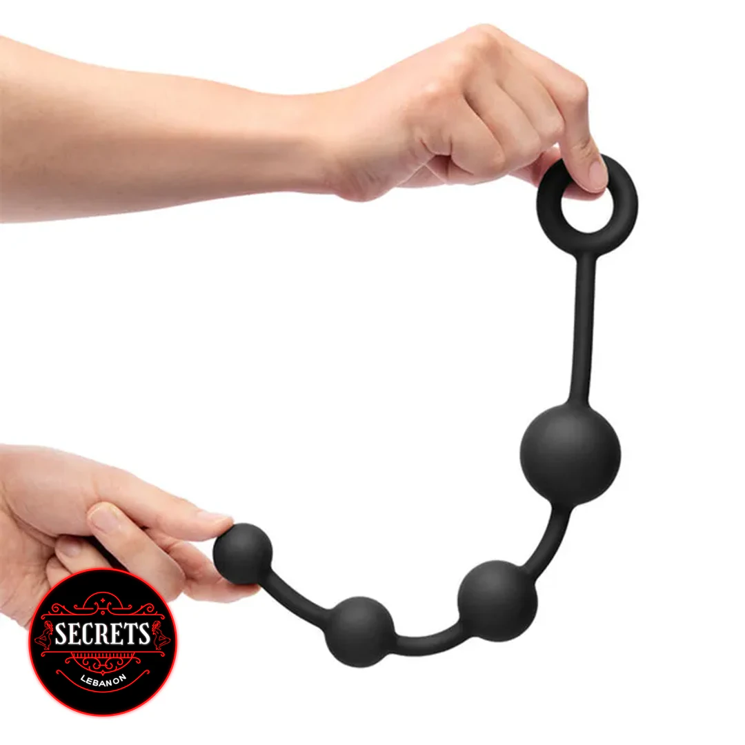 BlackOut Flexible Silicone Anal Beads held by two hands showing full length