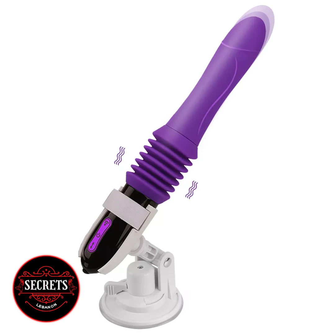 Cowgirl Thrusting Sex Machine with purple silicone dildo on suction cup base