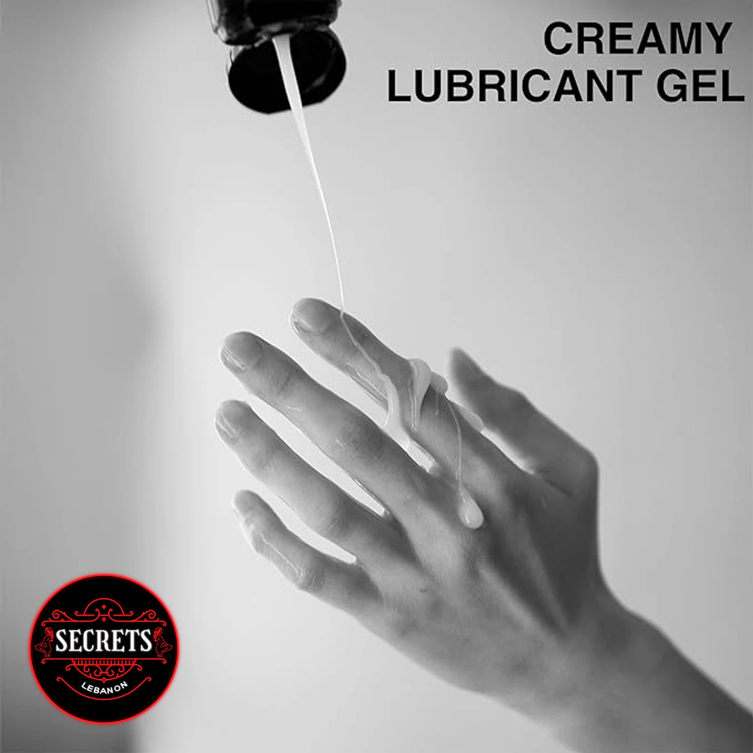 Creamy Cum Lubricant 150ml drizzling onto an open hand