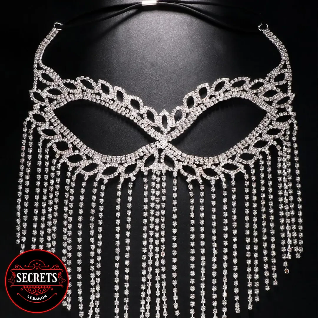 Crystal Rhinestone Tassel Face Mask displayed flat on black background