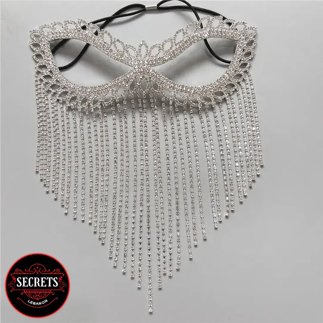 Crystal Rhinestone Tassel Face Mask with silver cutout design and long fringe chains