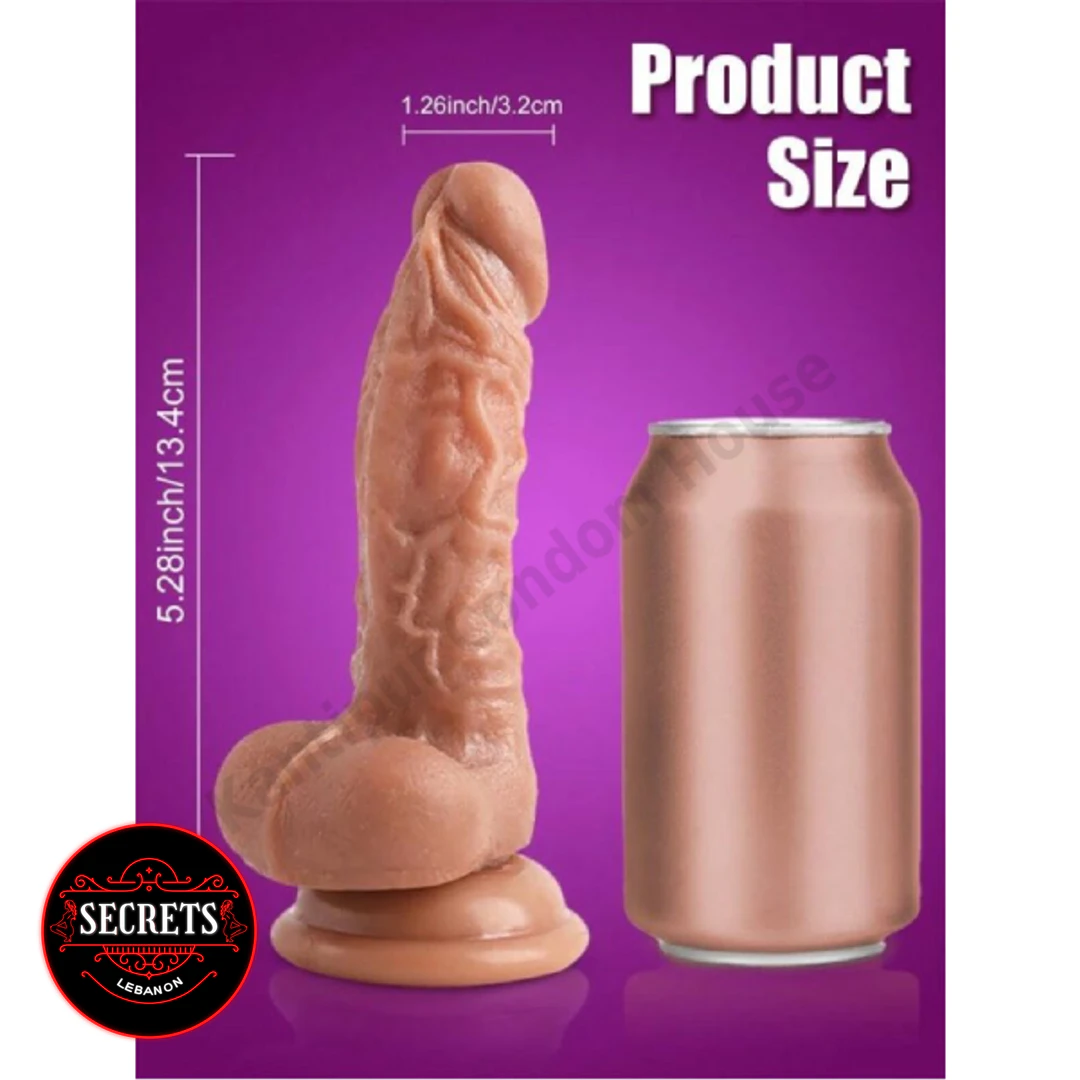 David Realistic Vibrating Dildo shown upright beside can for scale