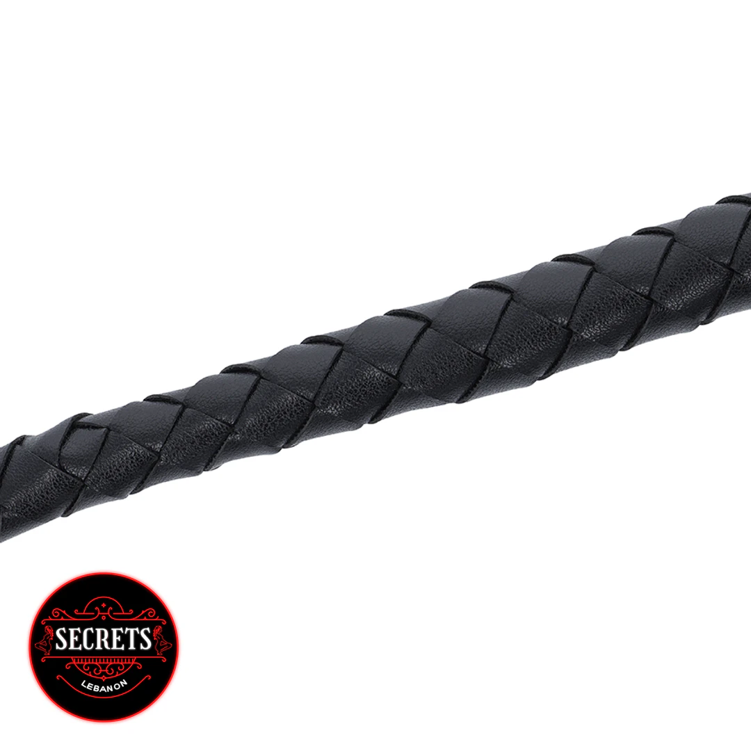 Dominatrix Braided Leather Whip close-up showing black interwoven leather texture