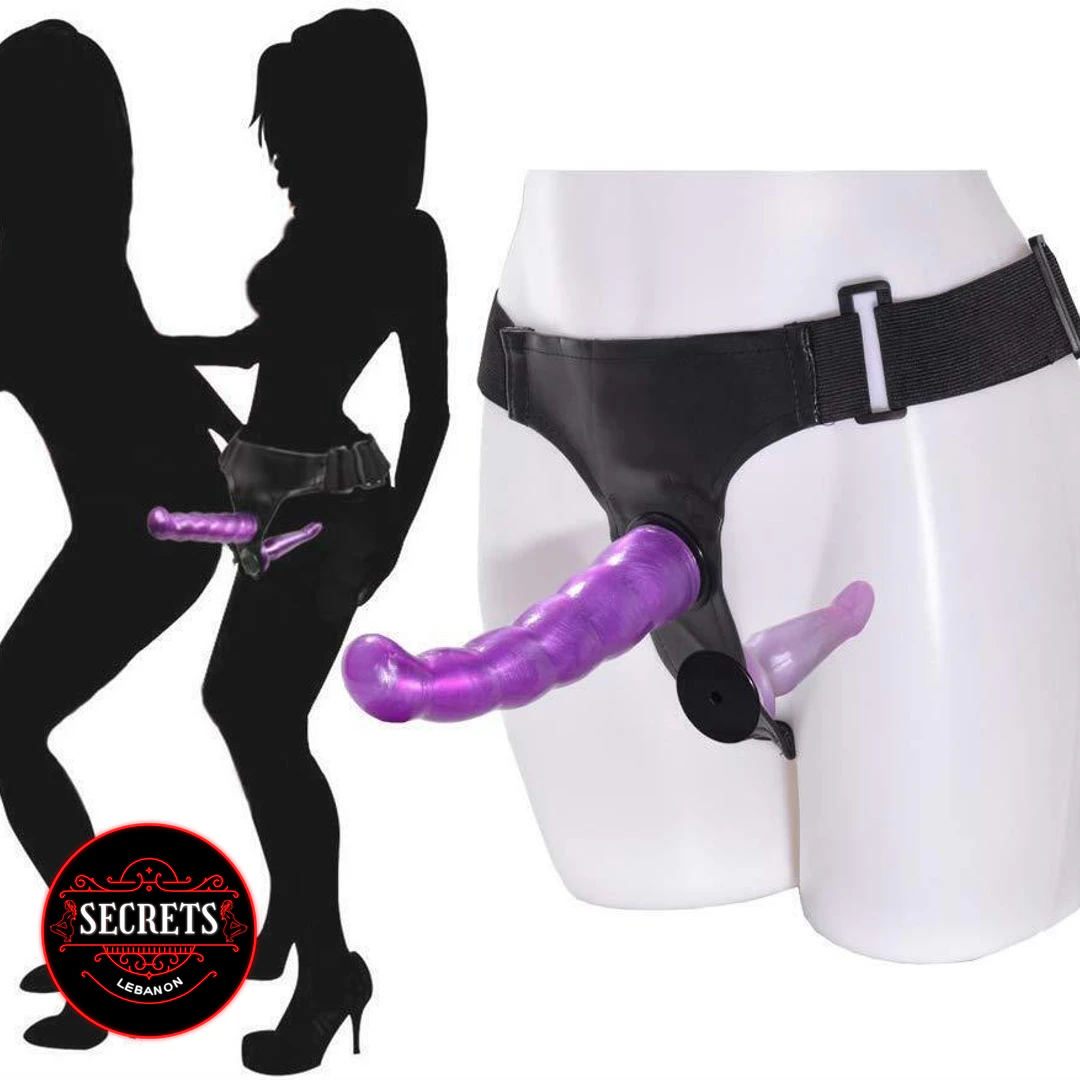 Dual Ribbed Double Strapon with black harness and purple dildos on mannequin
