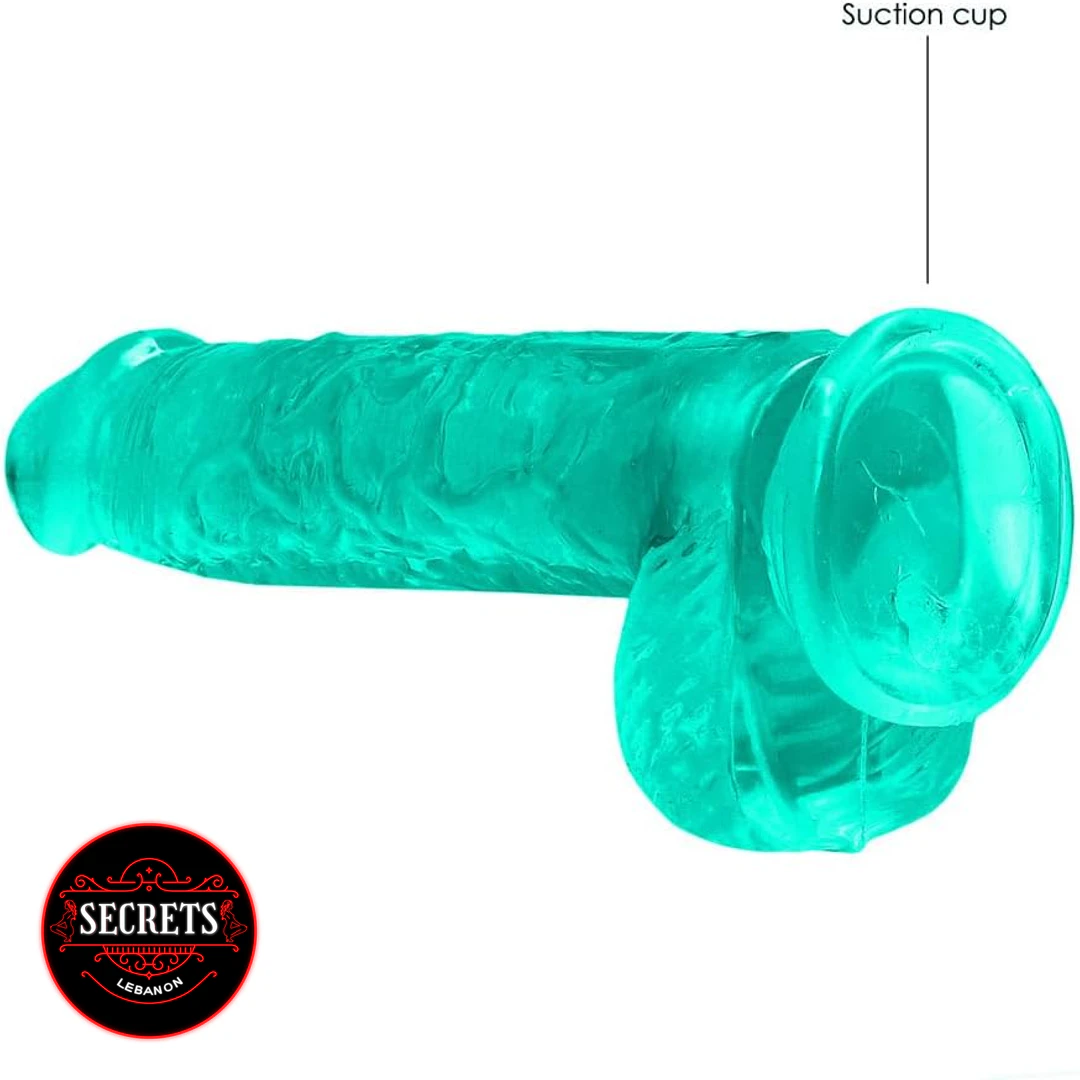 FlexCore Suction Base Dildo shown side view in transparent teal jelly material