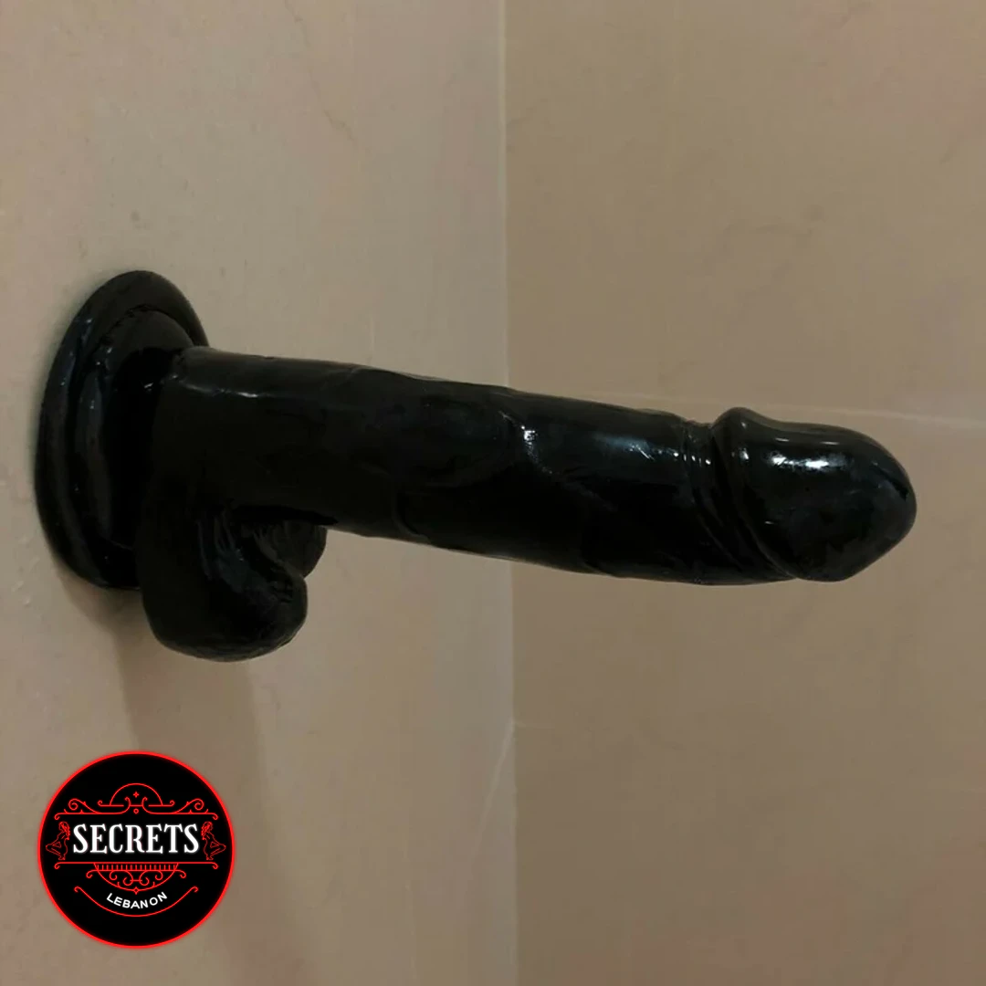 FlexCore Suction Base Dildo mounted on wall glossy black side view