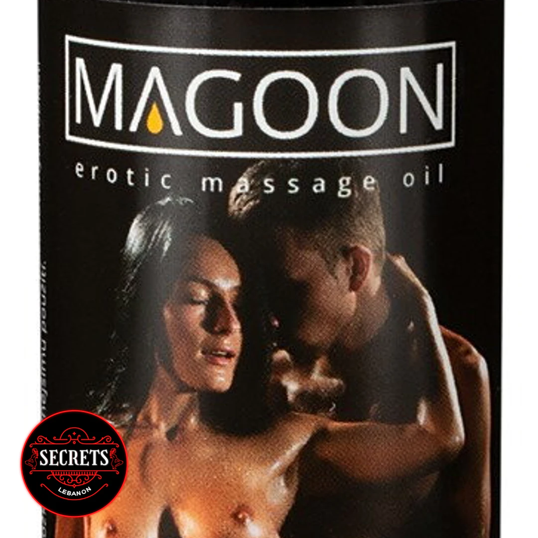 Magoon Erotic Massage Oil black bottle featuring couple label close-up