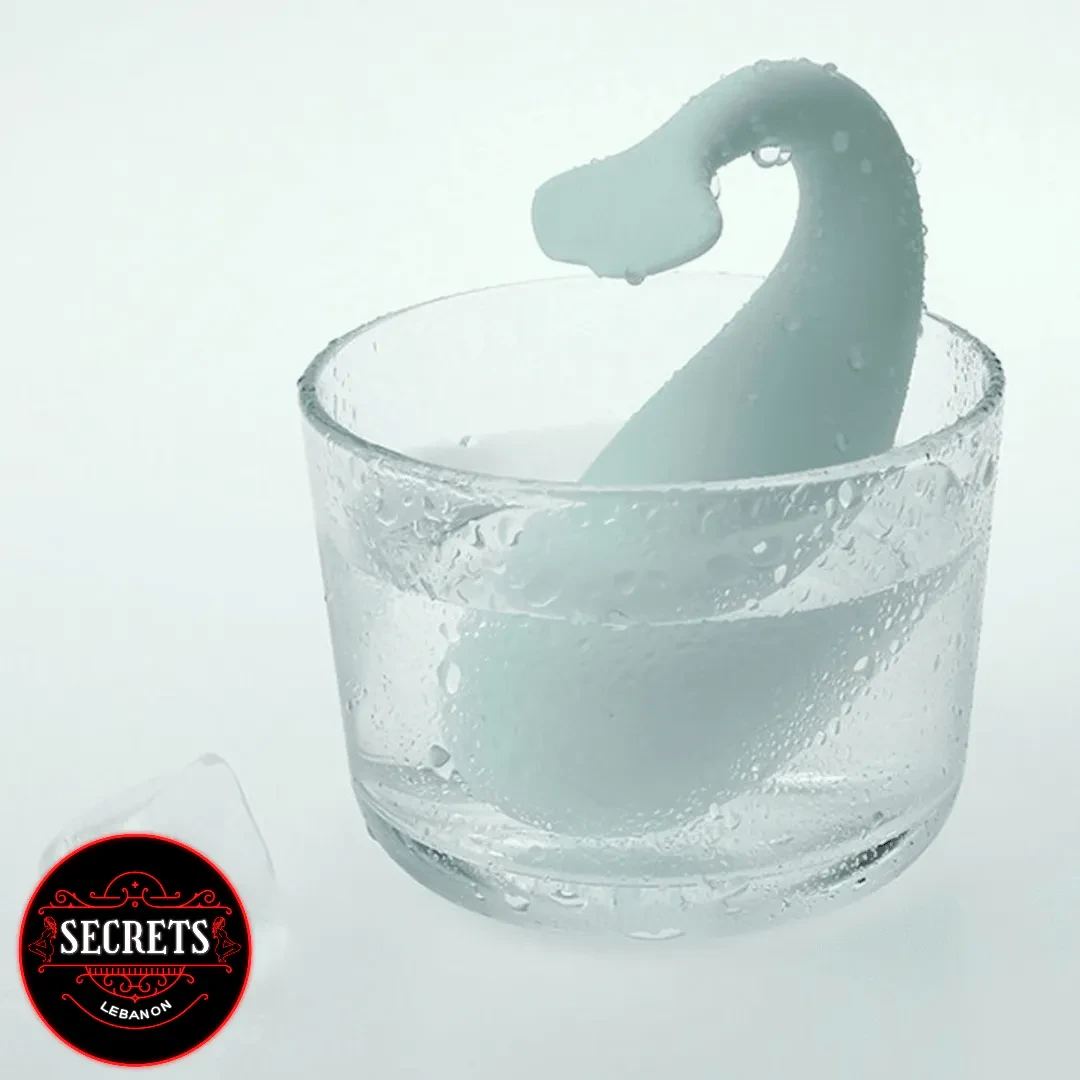 Monster Pup Whale App Controlled Vibrator submerged in water-filled glass