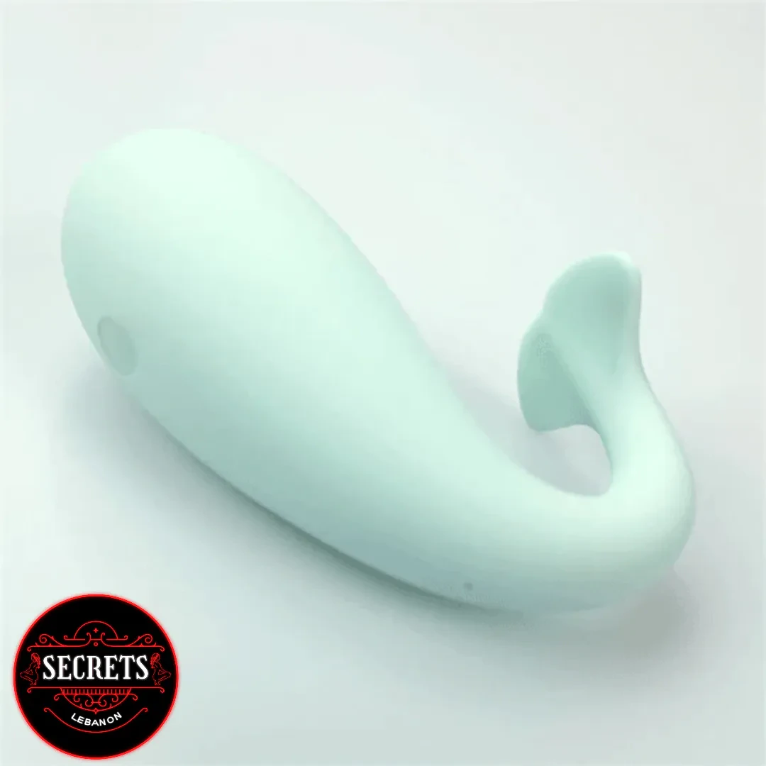 Monster Pup Whale App Controlled Vibrator in mint silicone on white background