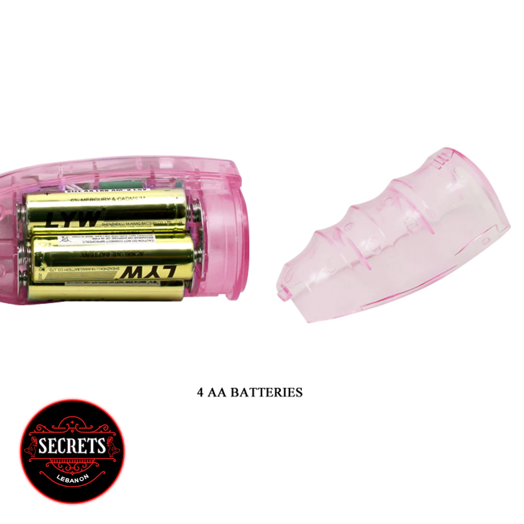 Multi Speed Rotating Rabbit Vibrator battery compartment open showing four AA batteries pink