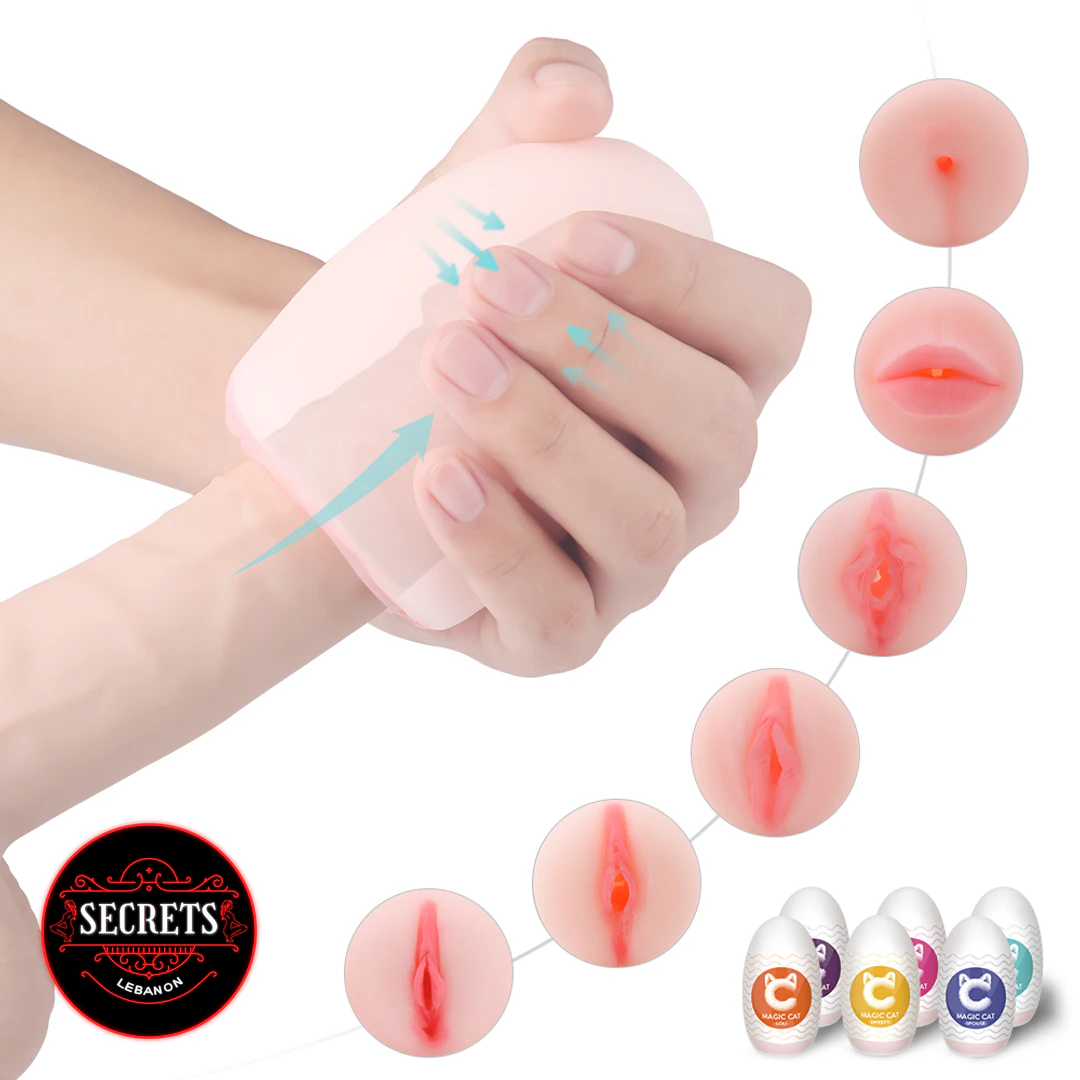 S-Hande Magic Cat Compact Masturbator squeezed in hand showing flexible skin-tone silicone