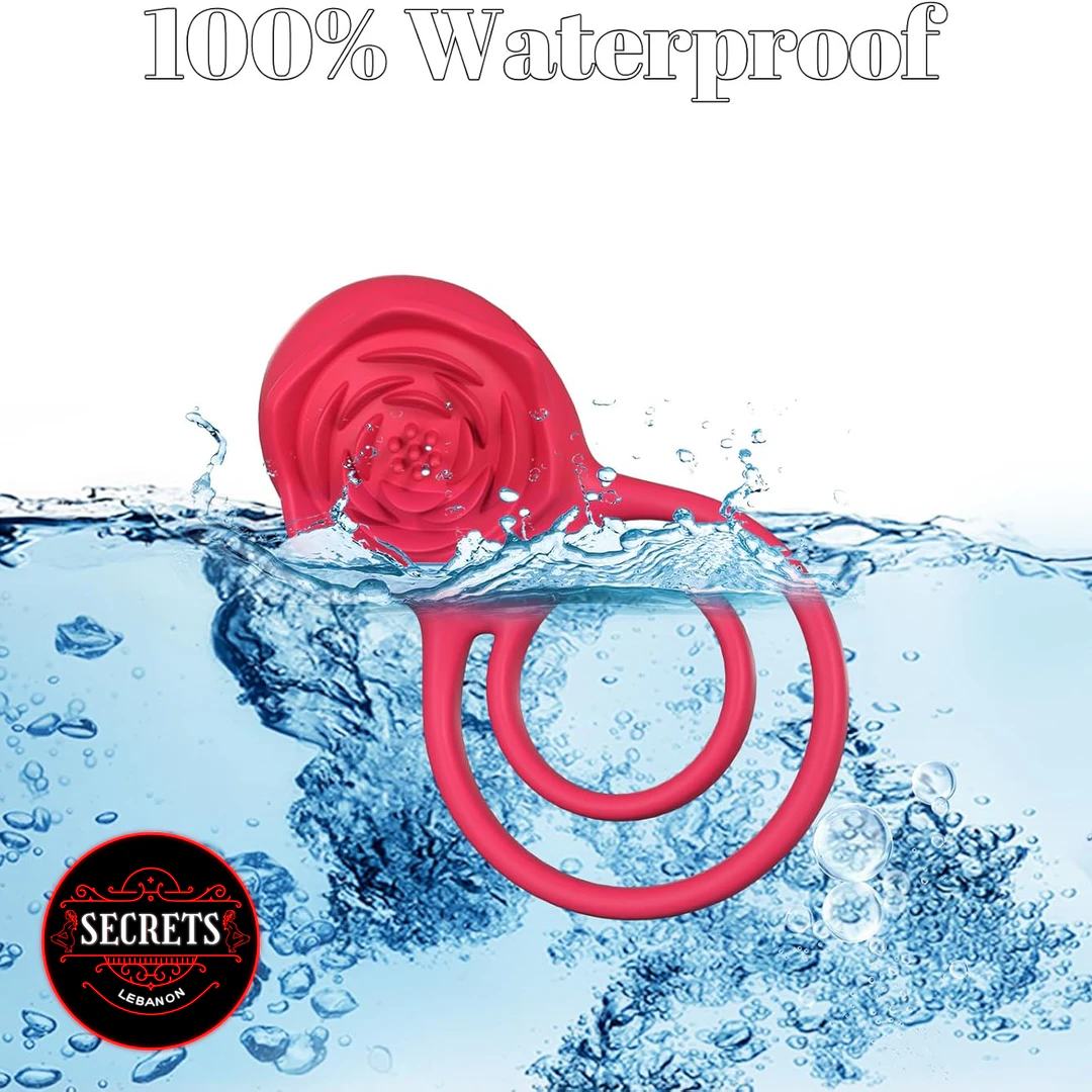 Silicone Rose Clitoral Cock Ring submerged in splashing blue water, red