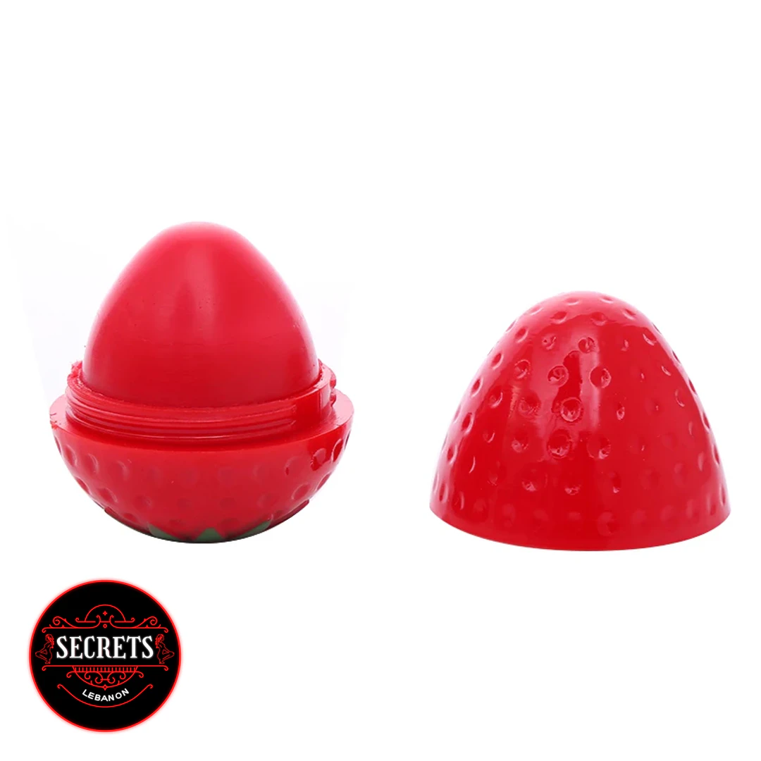 Strawberry Kiss Lip Balm open red strawberry-shaped container with lid removed
