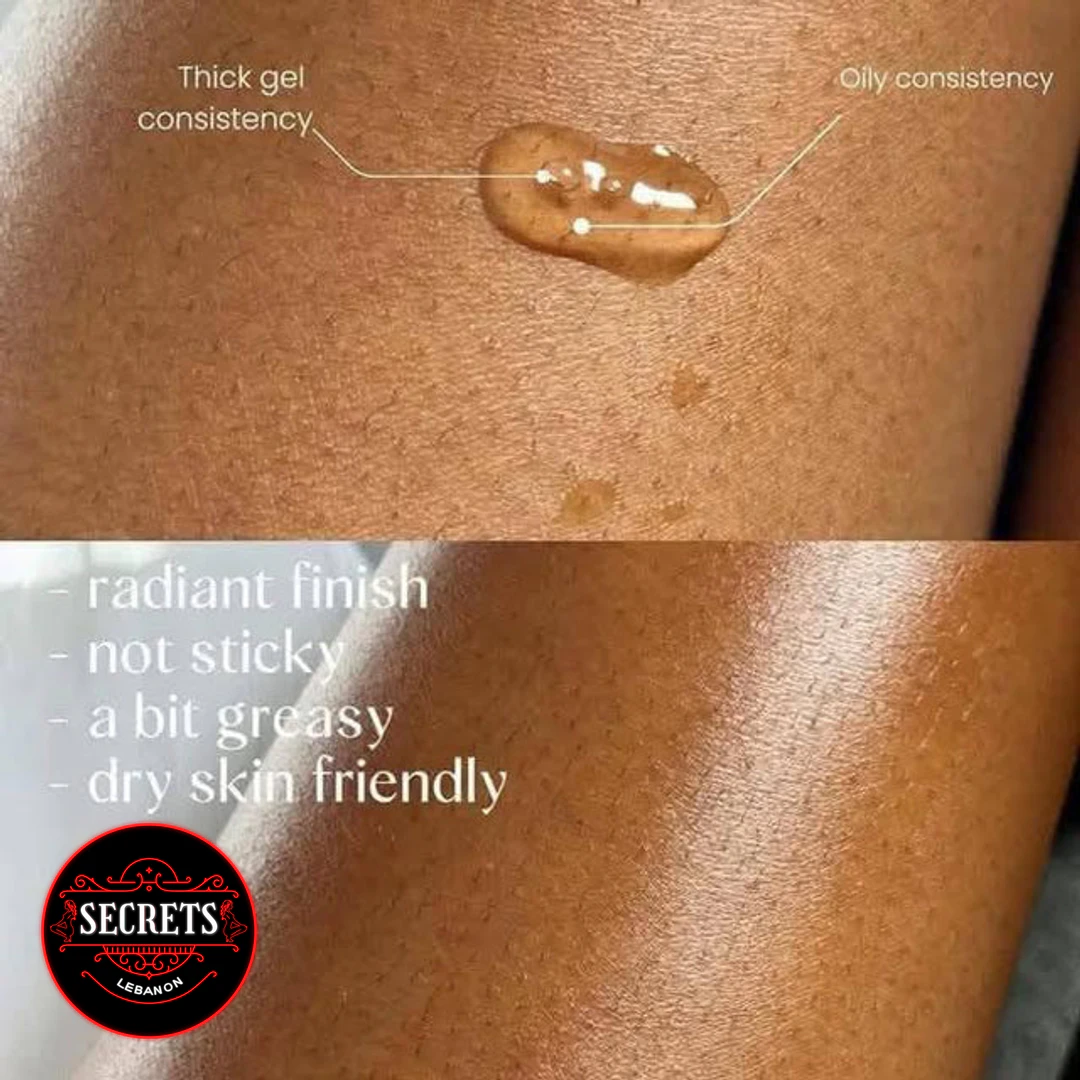 Vaseline Vitalising Body Oil gel swatch on dark skin radiant finish
