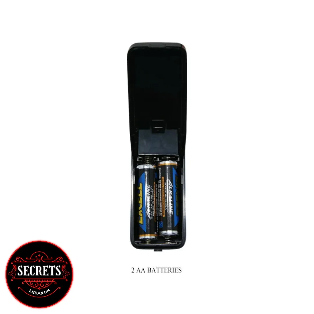 Vibrating Male Torso Masturbator battery compartment open showing two AA alkaline batteries