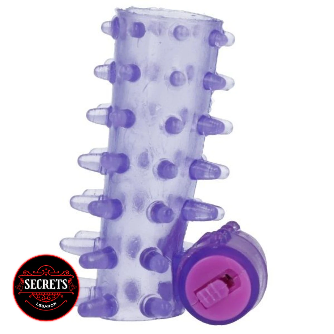 Vibrating Silicone Penis Sleeve in purple with all-over nubs and bullet vibrator
