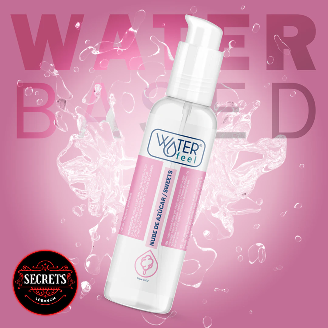 Waterfeel Cotton Candy Flavored Lubricant clear pump bottle on pink background