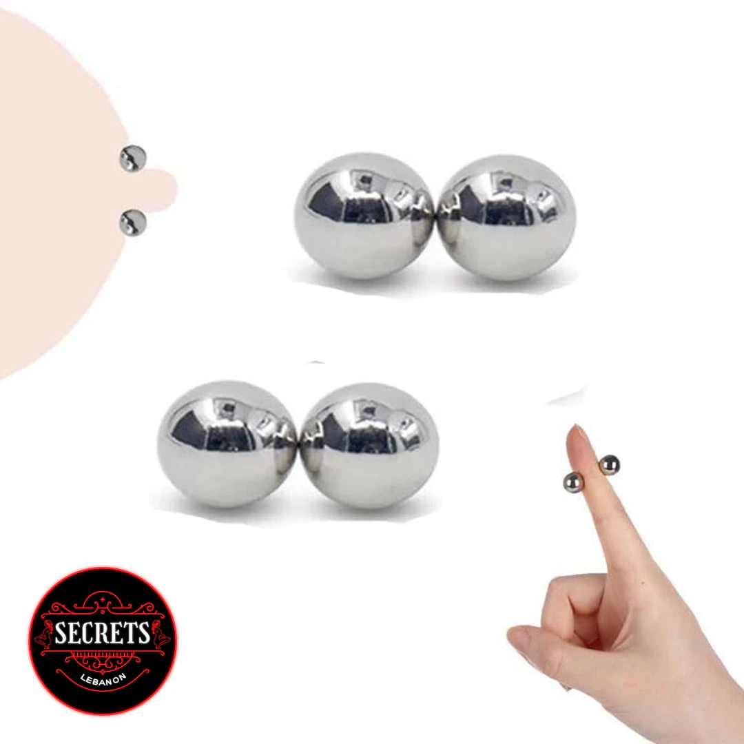 2 Pair Magnetic Steel Ball Clamps polished silver spheres with hand size reference