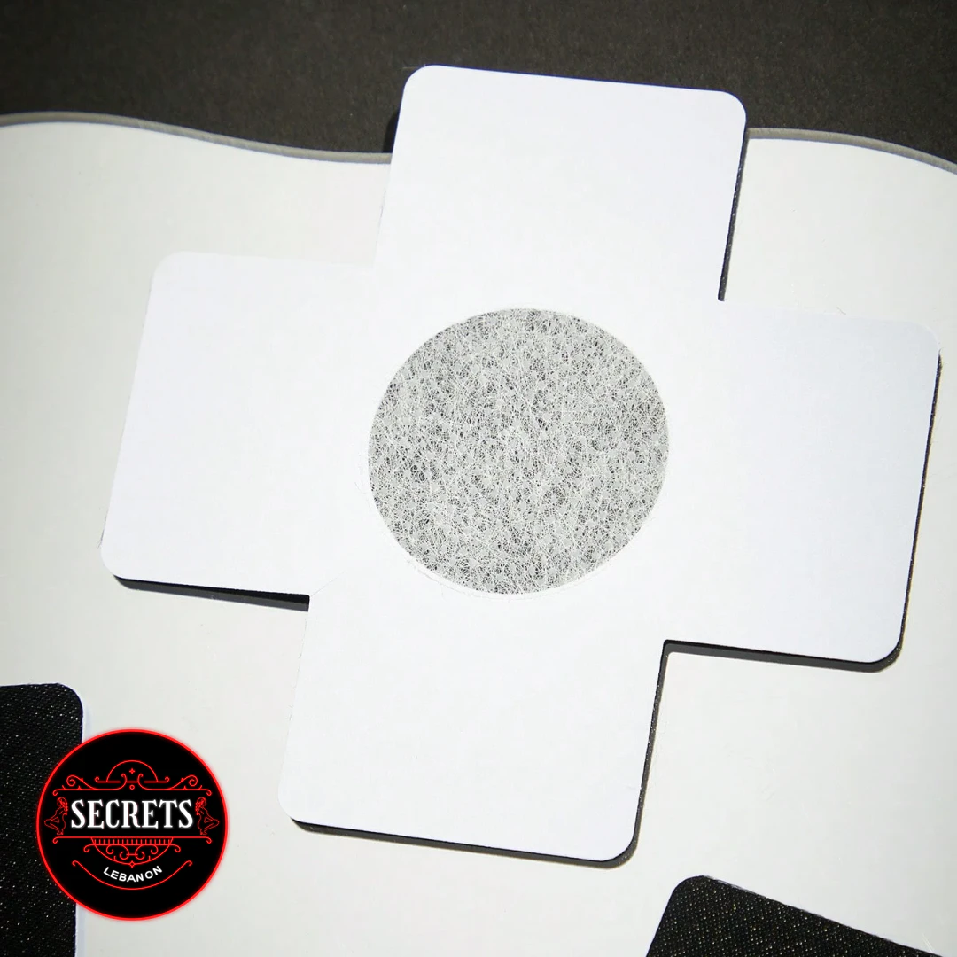 2 Piece Kiss Me Nipple Pasties white cross-shaped with round velcro centre
