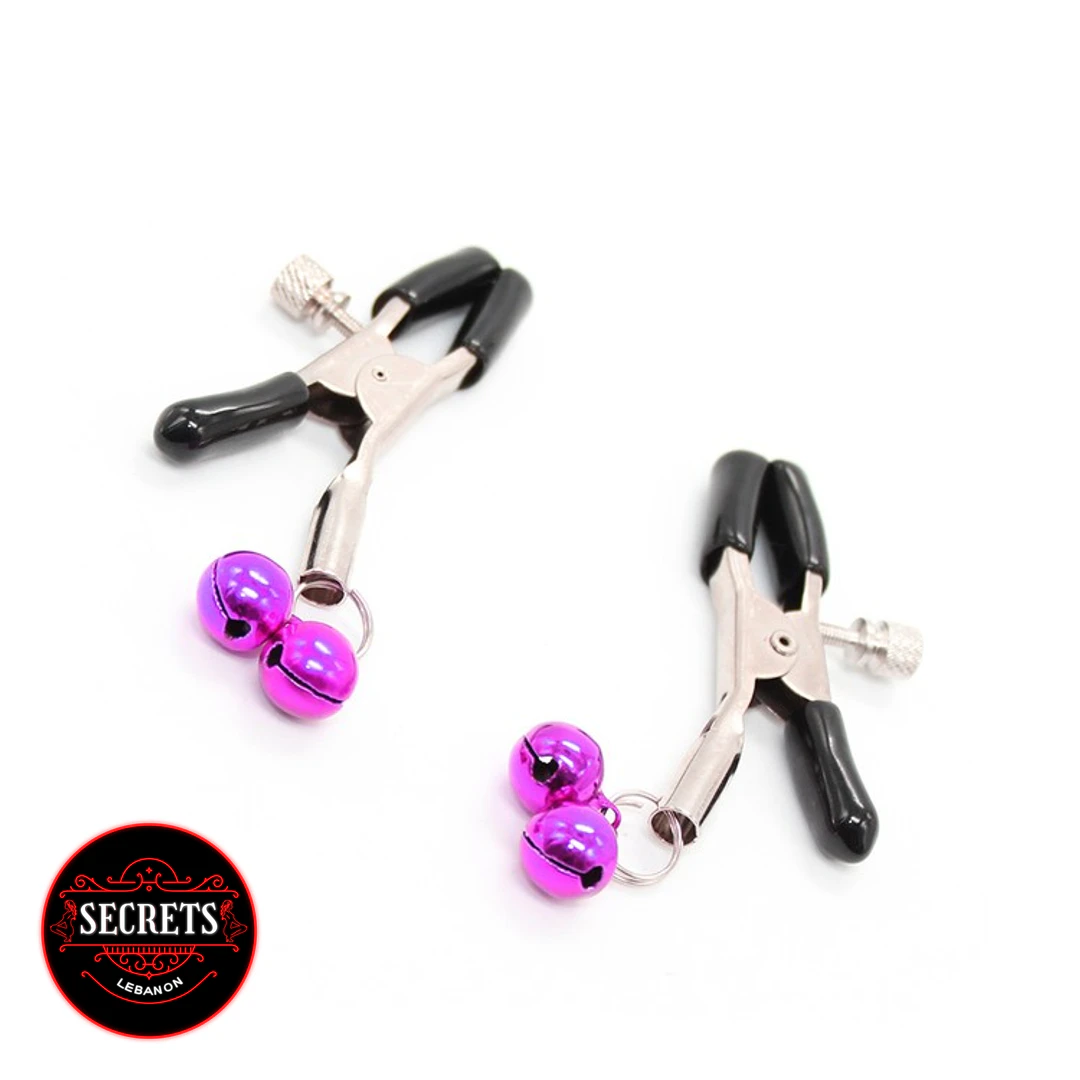 7 Piece Beginners BDSM Kit nipple clamps with pink bells on white