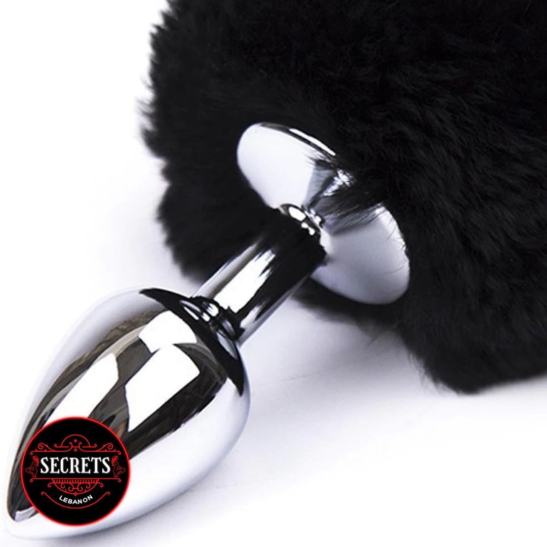 Darkness Pom Pom Steel Anal Plug with fluffy black fur tail close-up