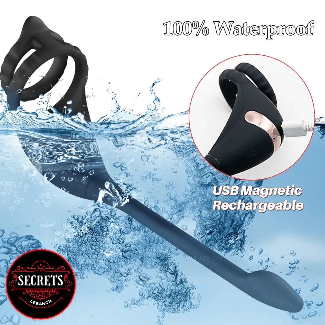 DualStrike Silicone Anal Hook Cock Ring submerged in water with USB magnetic charger