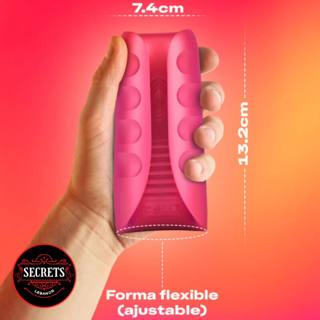 Durex Play Ride And Vibe Vibrating Stroker held in hand pink flexible silicone