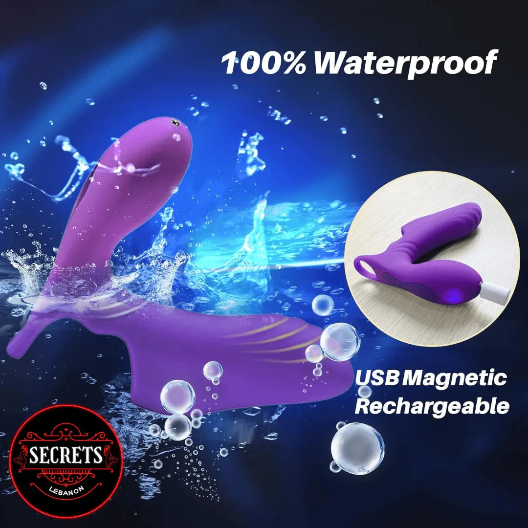 FlexWing Silicone Finger Vibrator in purple submerged in water splashes