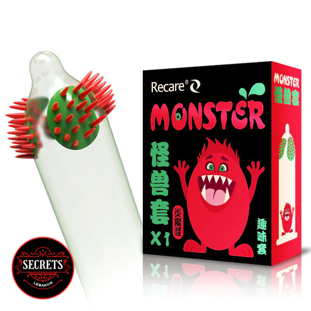 Recare Monster Ribbed Condoms with spiked green tip beside black novelty box