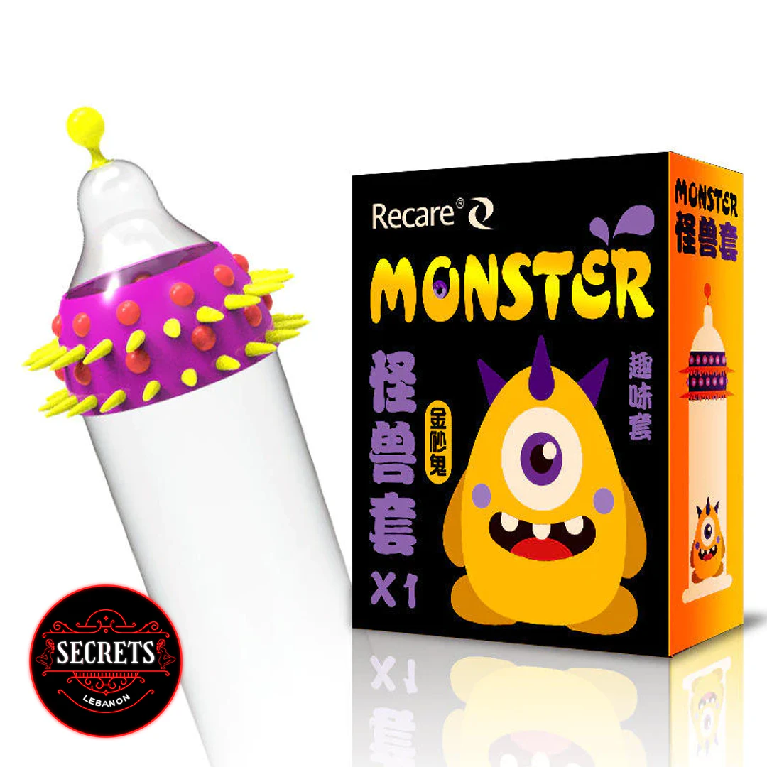 Recare Monster Ribbed Condoms with spiked purple ring beside black novelty box