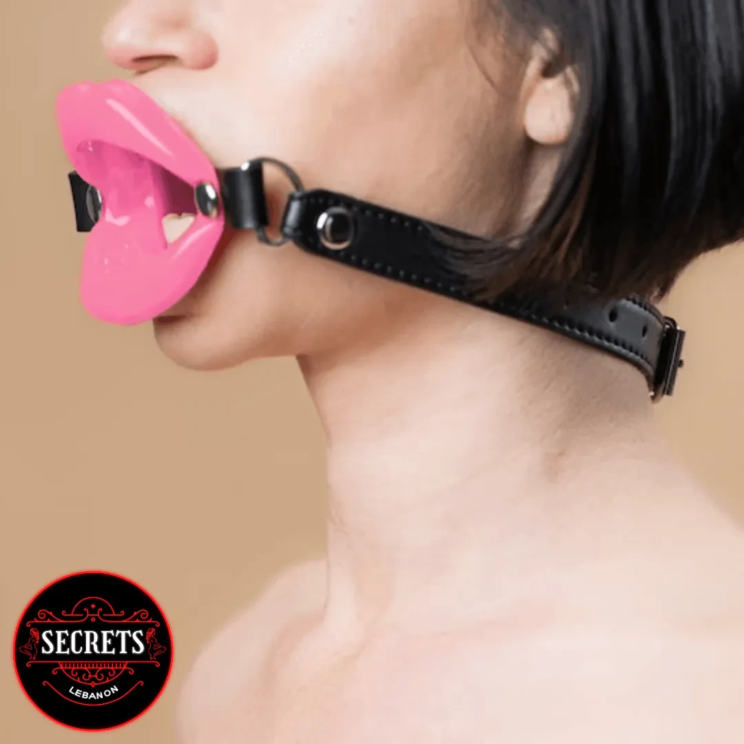 Red Lip Silicone Open Mouth Gag with black leather strap side view