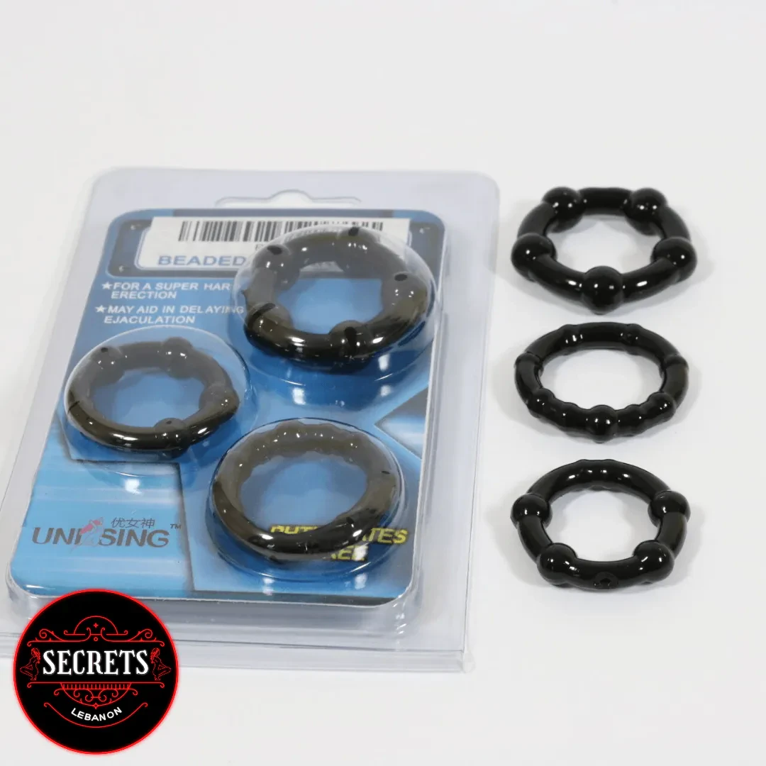 StayHard Silicone Cock Ring Trio three black beaded rings beside blue packaging