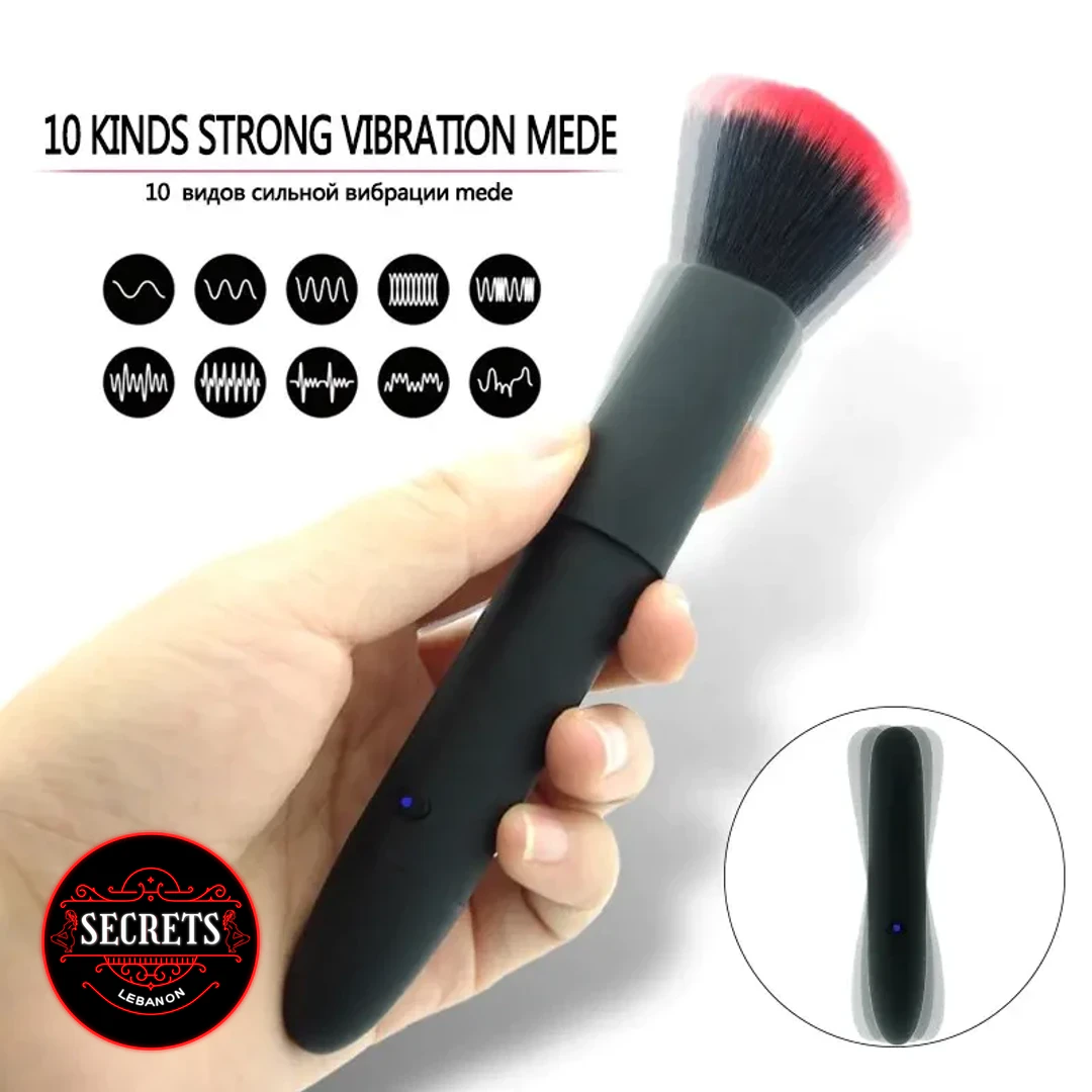 Stealthbrush10ModeVibrator-4 StealthBrush 10 Mode Vibrator held in hand with red and black brush tip