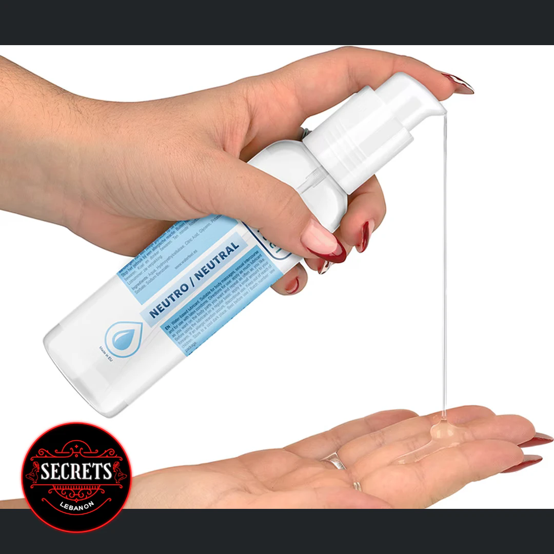 Waterfeel Neutral Water Based Lubricant dispensed onto open palm from pump bottle