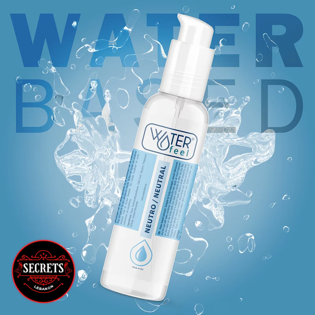 Waterfeel Neutral Water Based Lubricant pump bottle against blue splash background